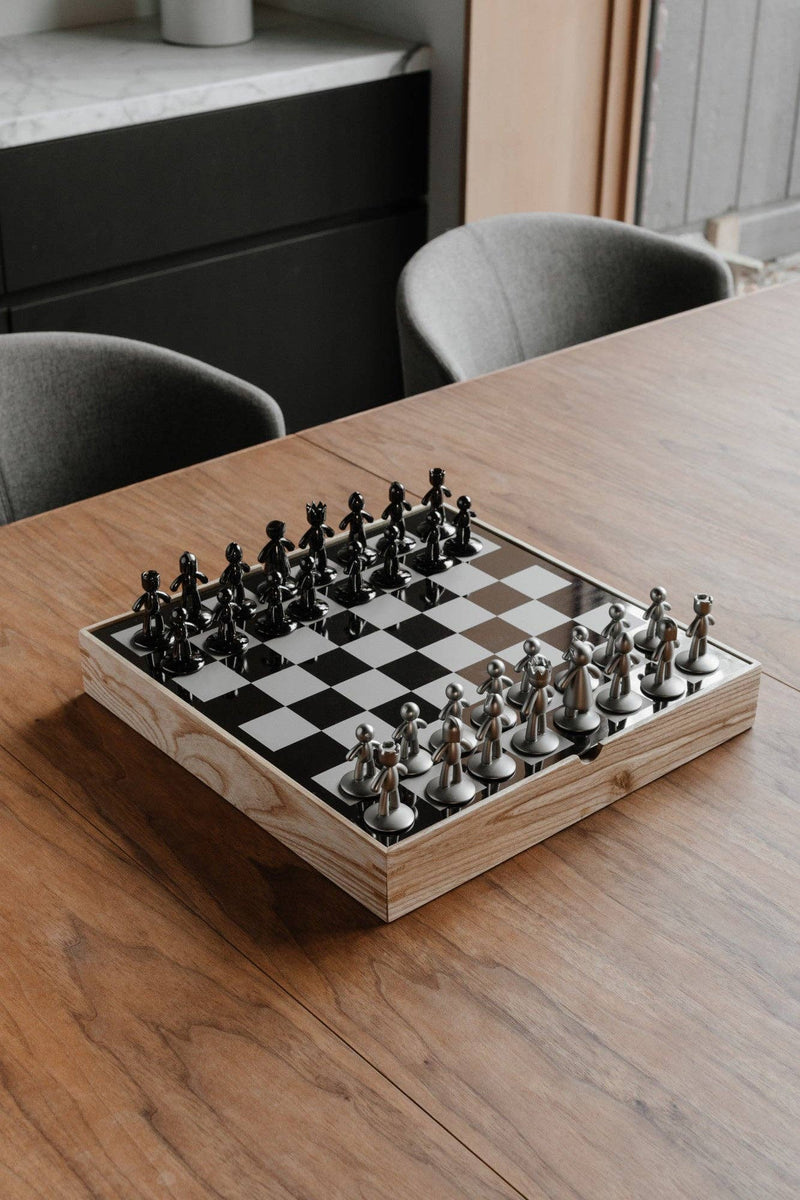 Modern Buddy chess set with mirrored board and gunmetal and silver figure pieces