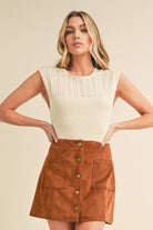 A high-neck tank top named "Hazel".