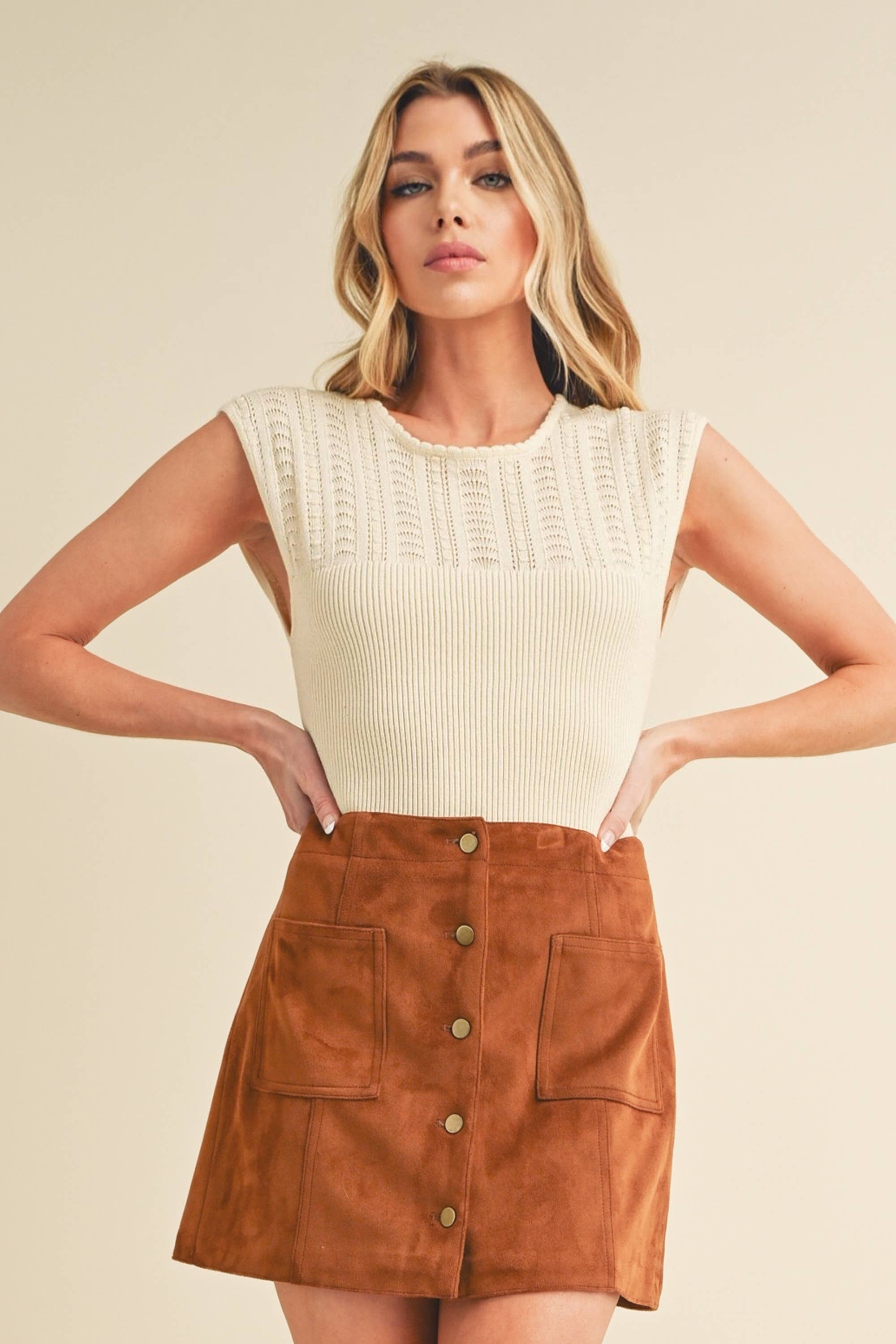 A high-neck tank top named "Hazel".