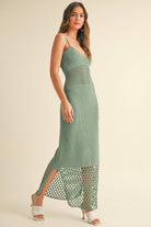 Model wearing the Maren Knitted Dress with delicate straps, mesh waist detail, and open-stitch hem.