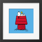 Framed print of Snoopy resting on his red doghouse with Woodstock perched beside him.