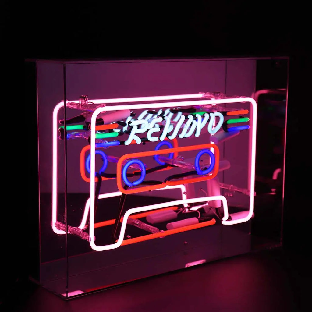 Vibrant Neon 'Cassette' Light in shades of blue, red, green, and pink, encased in a glossy acrylic box with a mirror back, making a striking retro statement.