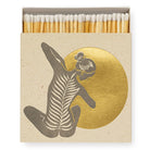 A square matchbox adorned with serene yoga poses.