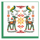 Decorative card with reindeer, birds, and floral patterns on a white background.