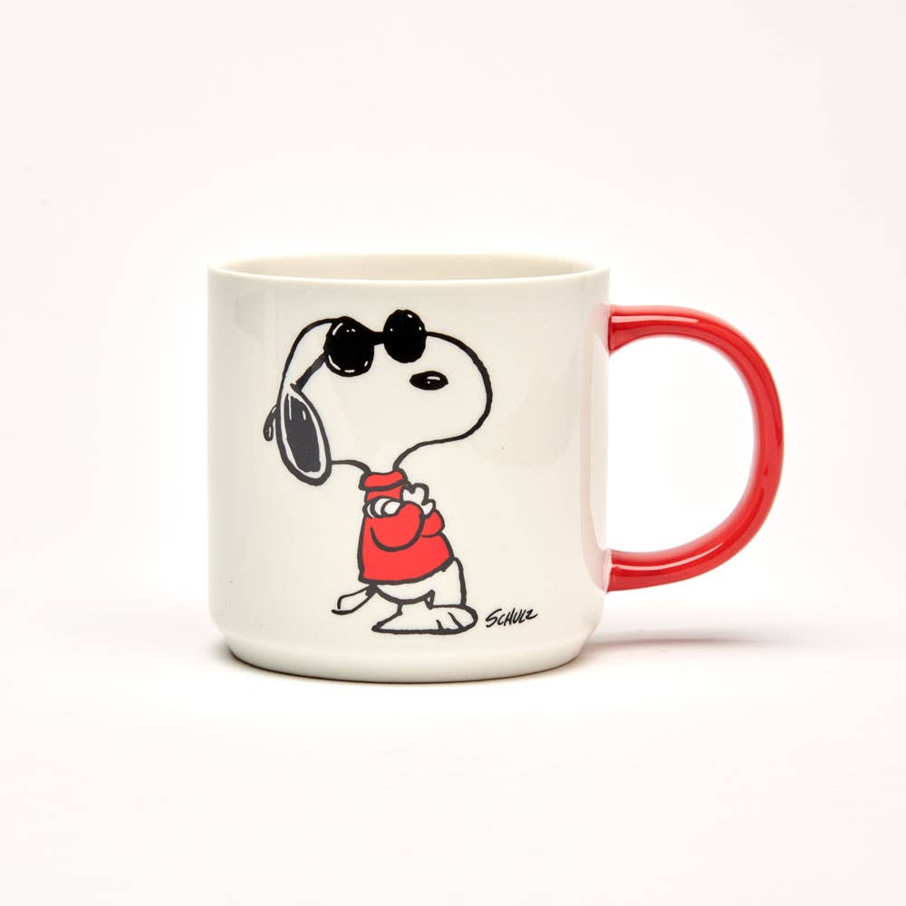 White ceramic mug with a red handle featuring a relaxed character in sunglasses and the phrase "Stay Cool" in bold lettering.
