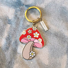 Daisy Mushroom Keychain - Charming accessory with a daisy-adorned mushroom design for playful and nature-inspired vibes.