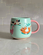FORMA Ceramic Cats Mug - Whimsical cat illustrations for charming coffee moments.