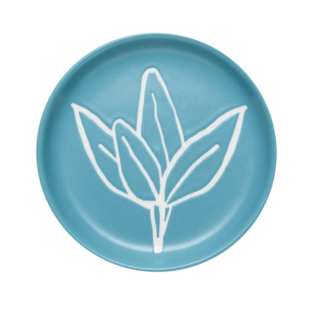 A Sage Leaf Coaster with a detailed leaf design, on a light-colored surface.