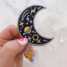 Cosmic Moon Patch, showcasing a beautifully designed moon within a cosmic background, symbolizing exploration and mystery.