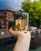 Chicago Candle: A lit candle emanating warmth and comfort, epitome of relaxation.