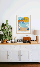 Elegant print illustrating Malibu's pristine beaches, waves, and coastal charm, celebrating its Californian essence.