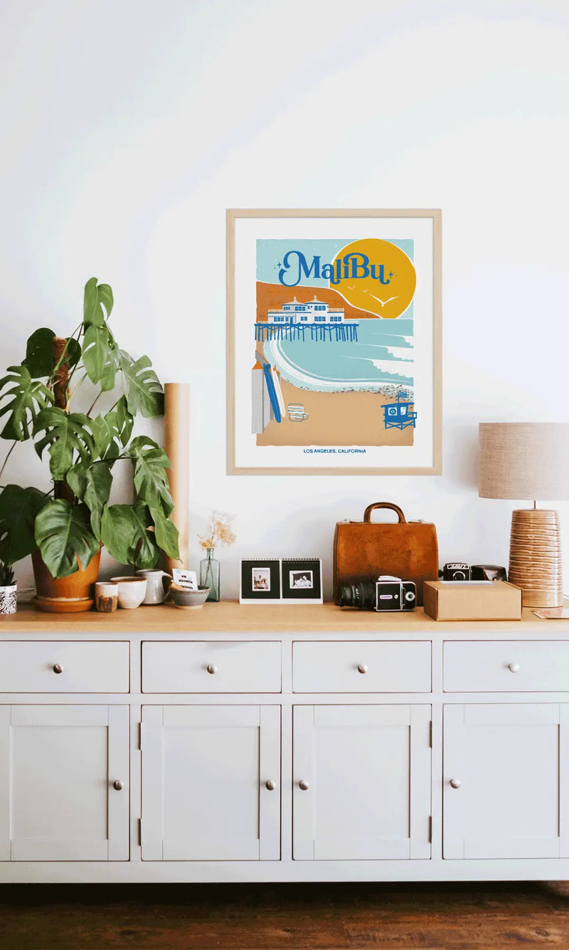 Elegant print illustrating Malibu's pristine beaches, waves, and coastal charm, celebrating its Californian essence.