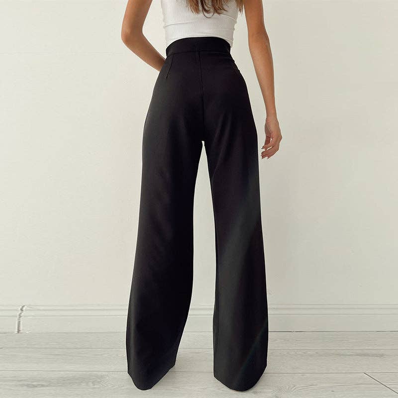 Woman wearing Urban Elegance Palazzo Pants in black color with a white crop top.