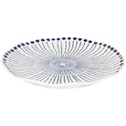 Sprout Stamped Plate with intricate blue radial patterns and an organic shape, ideal for serving and display.