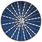 Pulse Stamped Plate, porcelain with vibrant blue and white stamped design.