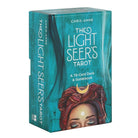 The Light Seer’s Tarot deck in teal packaging with illustration of a woman’s face, moon symbol, and swirling energy.