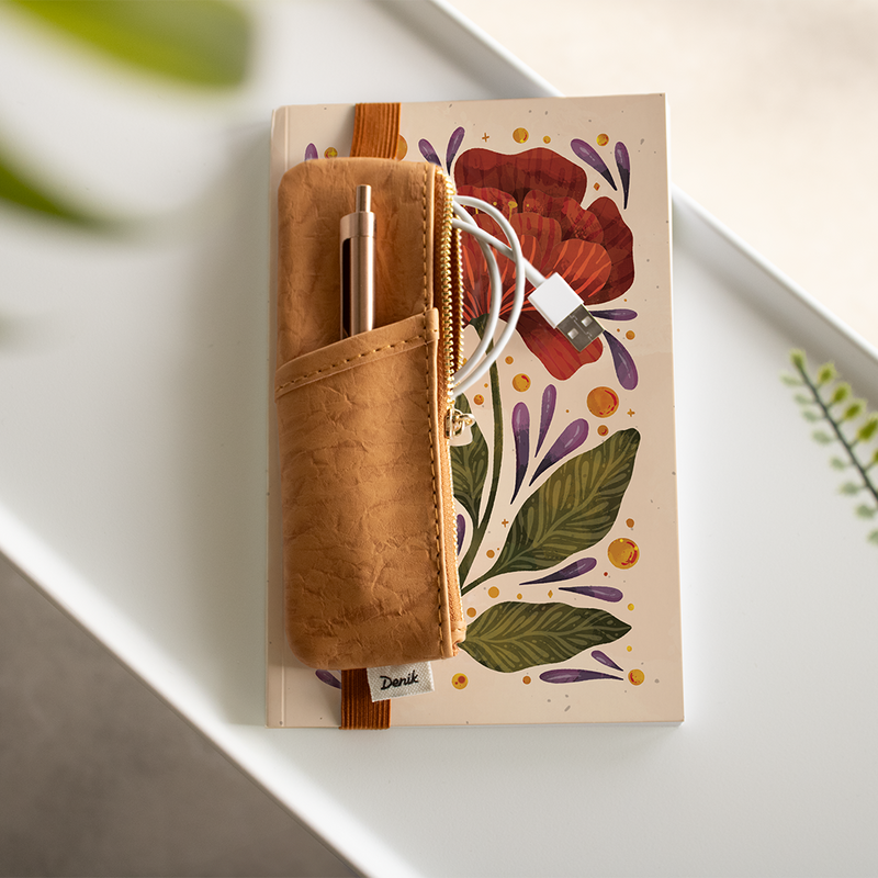 Brown vegan leather notebook pouch with a minimalist design.