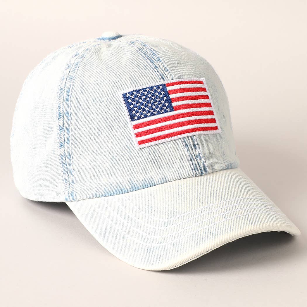 Light-wash denim baseball cap with embroidered American flag patch, ideal for 4th of July.