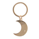 Moon phase crescent enamel keyring with gold-tone details.