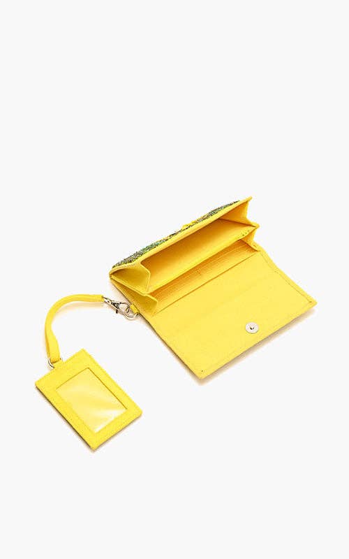 Yellow beaded wallet and card holder set with embroidered sunflower design and green leaf details.