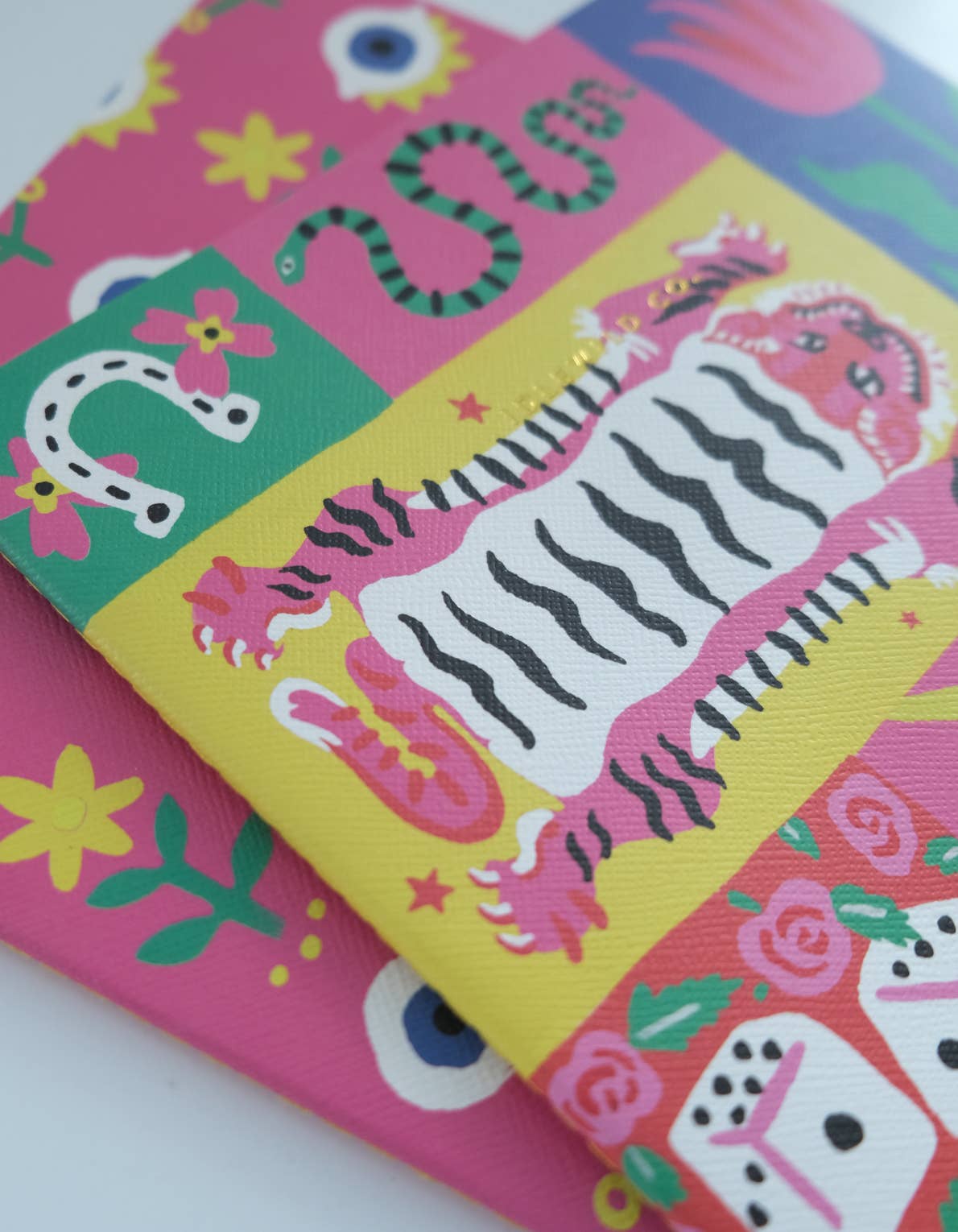 Colorful children's book with animal illustrations on a white background