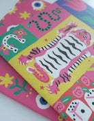 Colorful children's book with animal illustrations on a white background