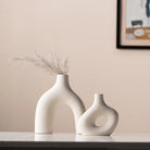 Arctic Essence Vases - Exquisite set with a sleek, minimalist design inspired by the serene beauty of the Arctic.