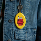 Peanuts Snoopy Doghouse Coin Pouch - A charming coin pouch with Snoopy's iconic doghouse design for a touch of nostalgia.