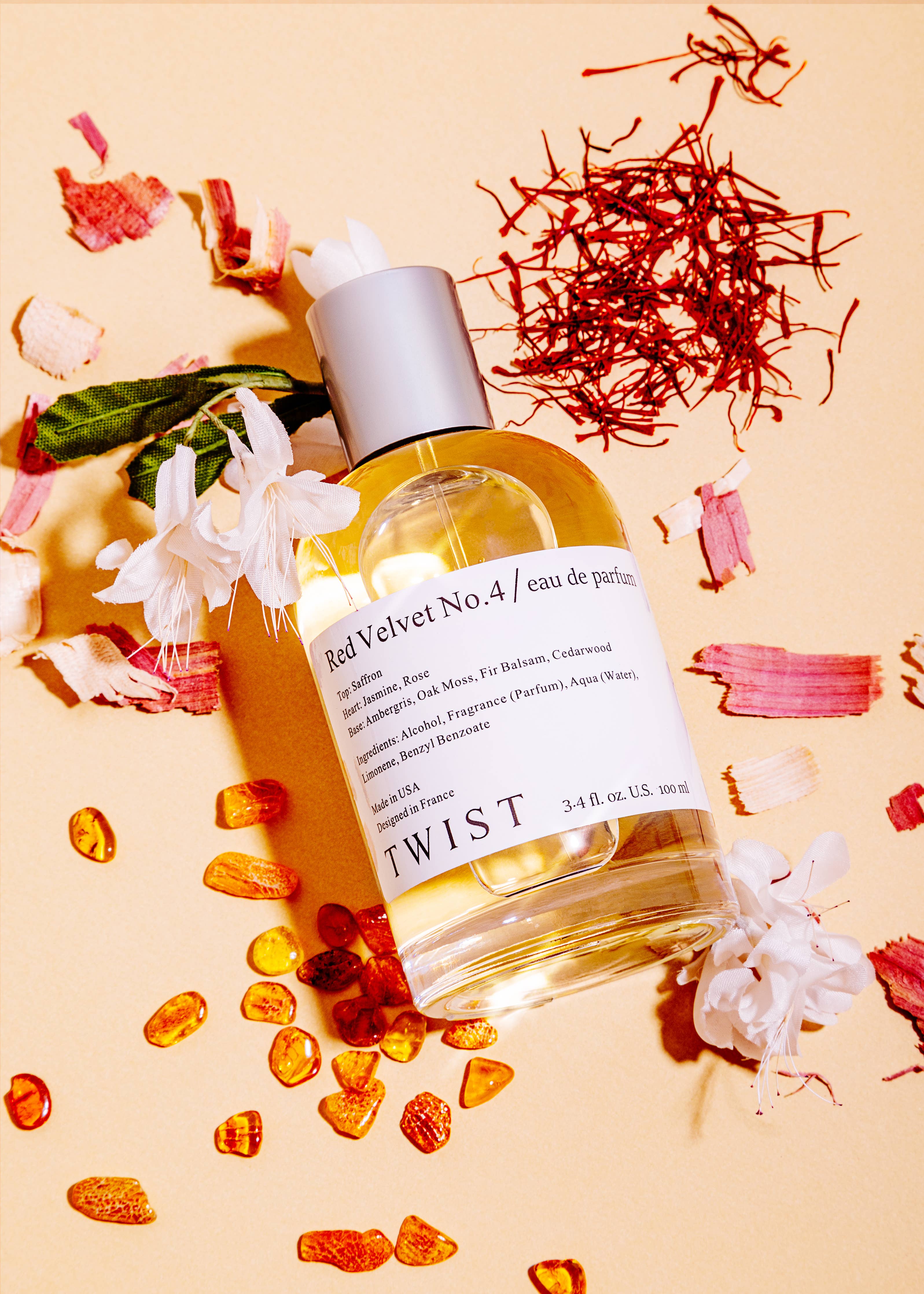 Bottle of Red Velvet No. 4 Eau De Parfum, featuring notes of saffron, jasmine, amber, and cedarwood for a luxurious and sophisticated fragrance.