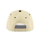 Beige cap with black dots on a white background
