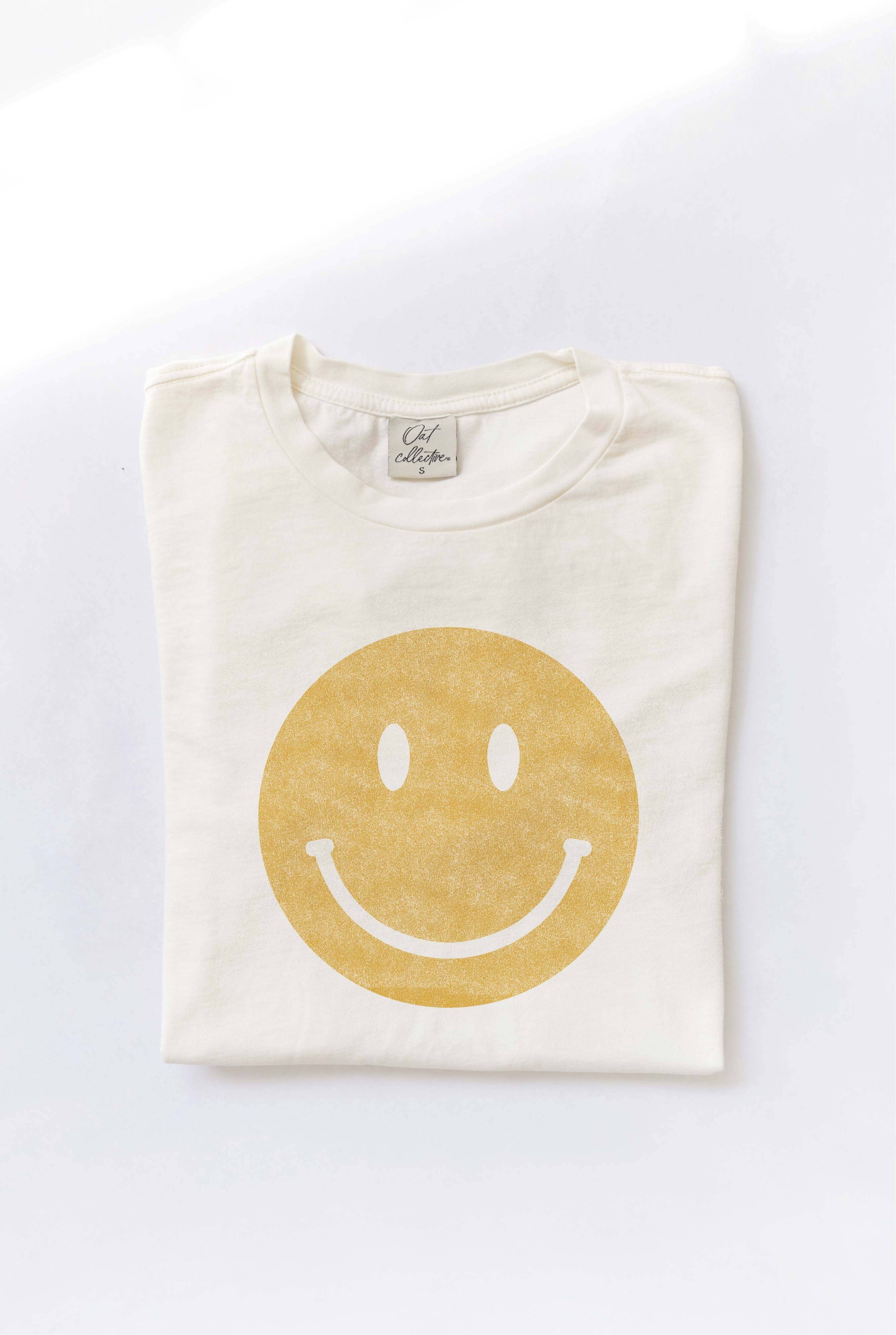 Smiley Face T-Shirt: Yellow shirt with a large smiley face design.