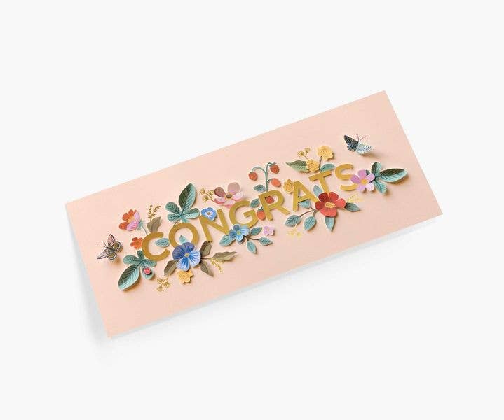 A congratulations card with colorful floral designs and gold "Congrats" lettering, paired with a gold envelope.