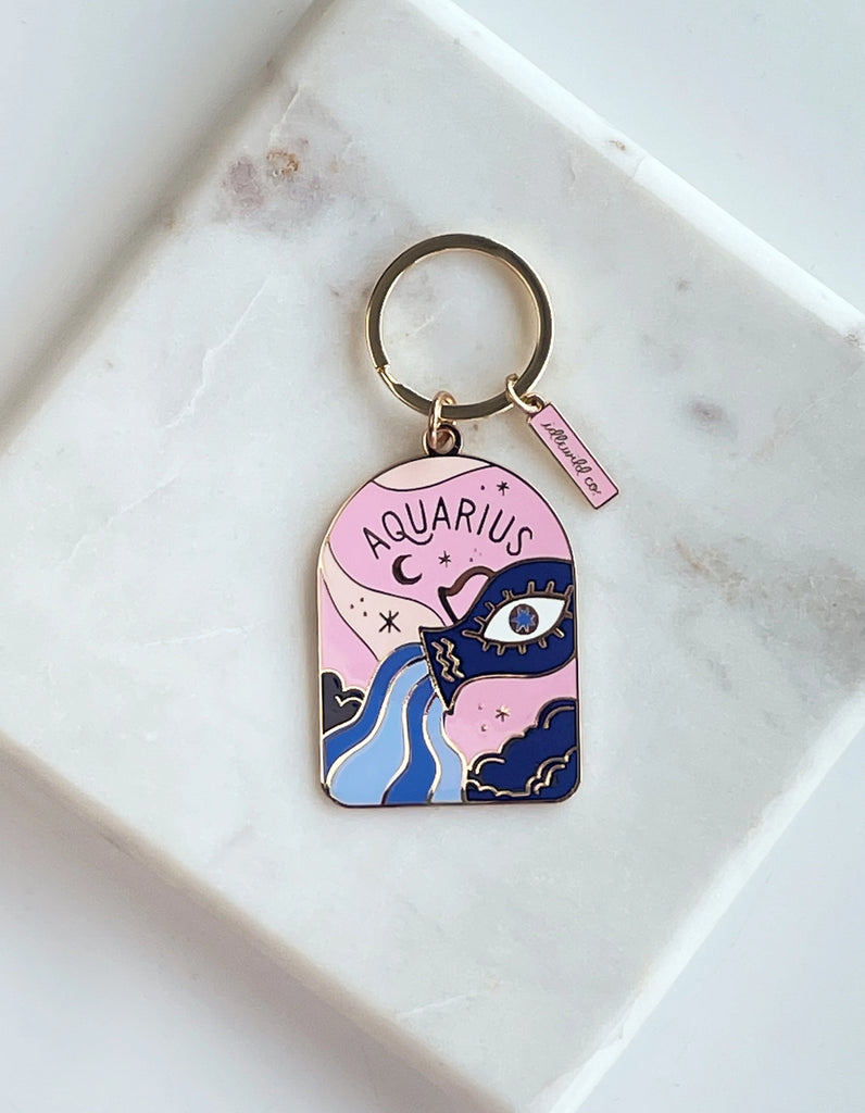 Aquarius Keychain - A sleek and stylish keychain featuring the iconic Aquarius symbol, perfect for expressing zodiac pride.