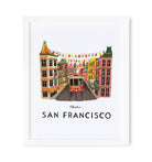 Framed San Francisco Chinatown print with colorful buildings, festive lanterns, and an iconic cable car on a bustling street.