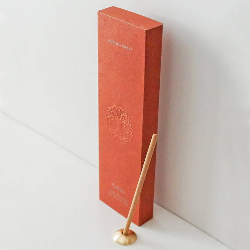 Gaia natural incense sticks in a terracotta box with an embossed tree design and built-in holder for relaxation and grounding.