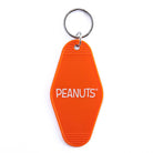 Peanuts® Snoopy Flower Bouquet Key Tag featuring Snoopy holding a bouquet of colorful flowers on a vibrant orange background.