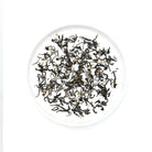Golden Monkey Black Tea, a hand-processed blend from Fujian Province with notes of walnut and a light cocoa finish.