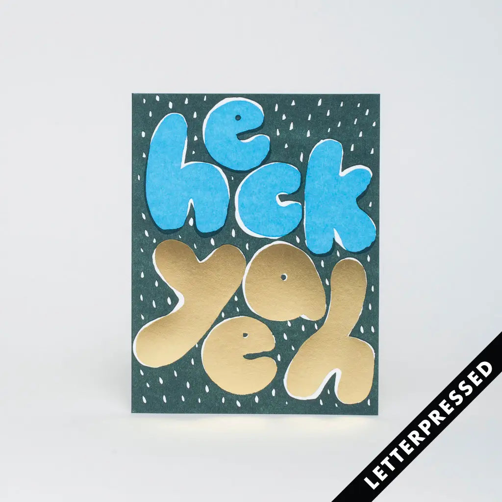 Image of the 'Heck Yeah Card', showcasing its vibrant design and the enthusiastic congratulations message.