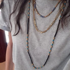 Naples Necklace: A symphony of elegance and contemporary design, an exquisite adornment for a refined look.