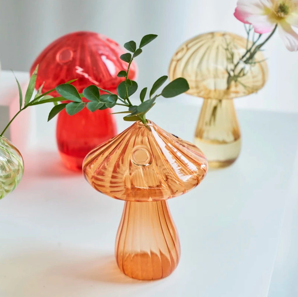 Vibrant red Mushroom Bud Vase made from durable borosilicate glass, an ideal vessel for showcasing flowers.