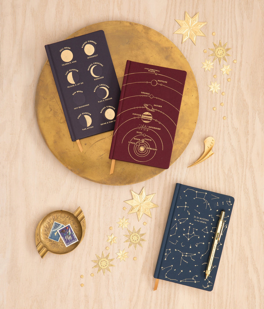 Image of the 'Moon Phases Journal', showcasing a mesmerizing lunar-themed cover design.