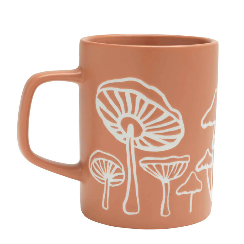 Ceramic Mushroom Mug with a whimsical mushroom pattern.