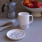 A charming Dogs Mug featuring fun and playful dog designs.