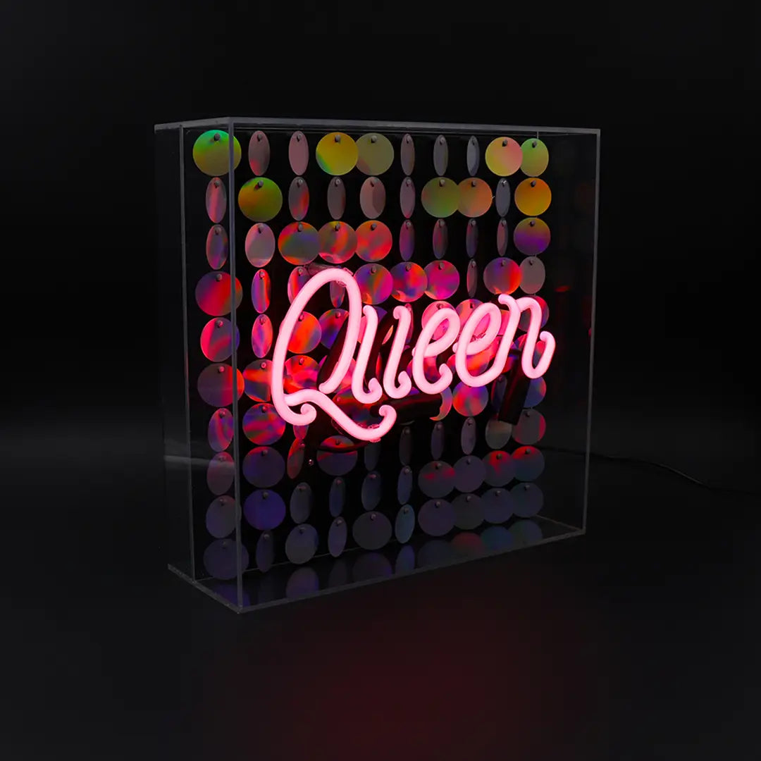 FORMA's Neon Queen Light, a radiant sign adorned with sequins, adding a touch of majesty and glamour to your decor.