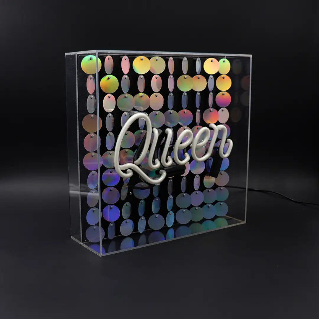 FORMA's Neon Queen Light, a radiant sign adorned with sequins, adding a touch of majesty and glamour to your decor.