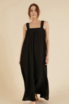 The Noa Straps Maxi Dress, made from 100% Turkish cotton, elegantly displayed, showcasing its delicate straps and flowing maxi length.