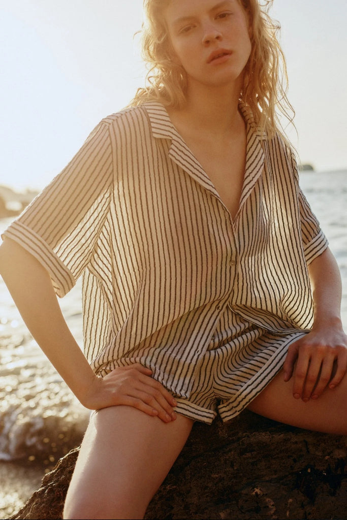Ocean Set: Stylish and contemporary ensemble with crisp white stripes for a beach-ready look.