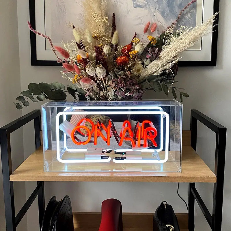 A vibrant Neon 'On Air' Light in a classic broadcasting sign style, perfect for adding a unique touch to your space.
