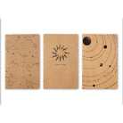 A set of Paper Astronomy Notebooks showcasing intricate celestial designs on a sturdy paper cover.