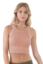 Model sporting FORMA's Vanessa Chain Knit Highneck Crop Top, highlighting its elegant high neck and intricate chain knit design.